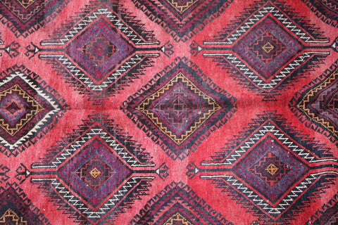 A hand-knotted Afghan Tribal Wool Rug