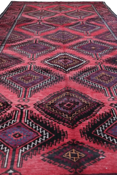 A hand-knotted Afghan Tribal Wool Rug