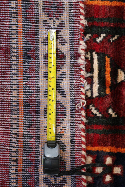 A hand-knotted Persian Qashqai Tribal Wool Rug