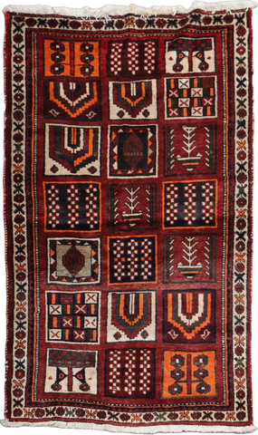 A hand-knotted Persian Qashqai Tribal Wool Rug