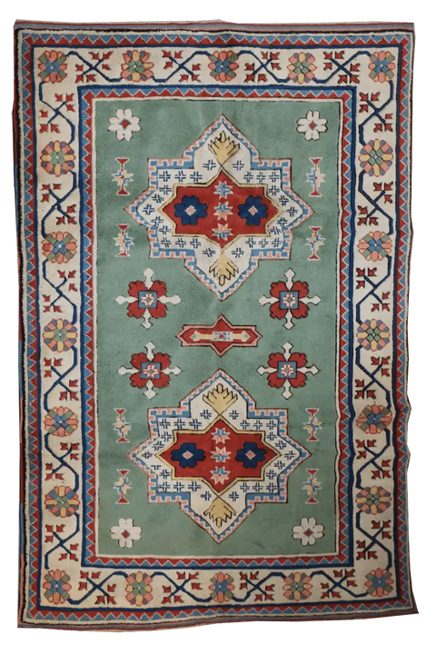 A rectangular Turkish Milas Tribal Wool Rug