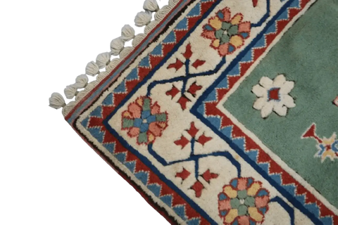 A rectangular Turkish Milas Tribal Wool Rug