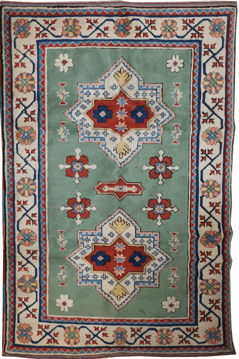 A rectangular Turkish Milas Tribal Wool Rug