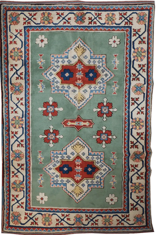 A rectangular Turkish Milas Tribal Wool Rug