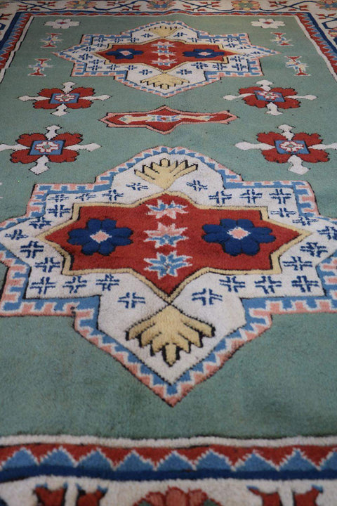 A rectangular Turkish Milas Tribal Wool Rug