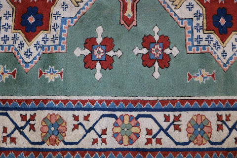 A rectangular Turkish Milas Tribal Wool Rug