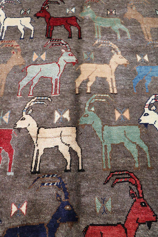 A Persian Qashqai wool rug