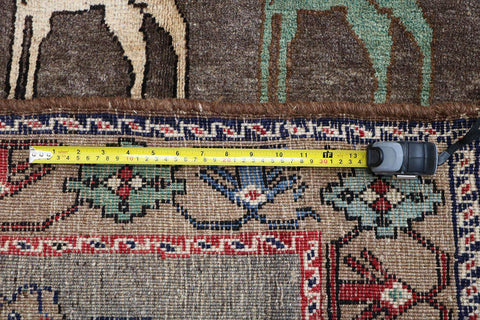 A Persian Qashqai wool rug