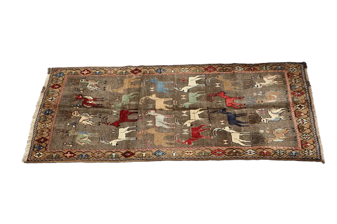 A Persian Qashqai wool rug