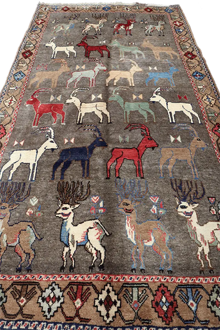 A Persian Qashqai wool rug