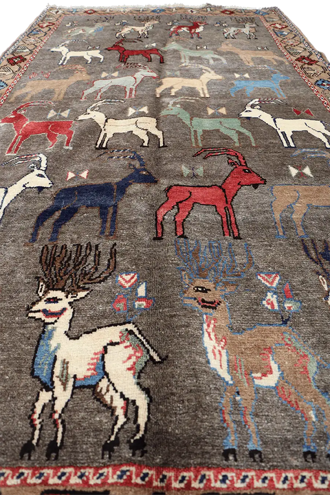 A Persian Qashqai wool rug