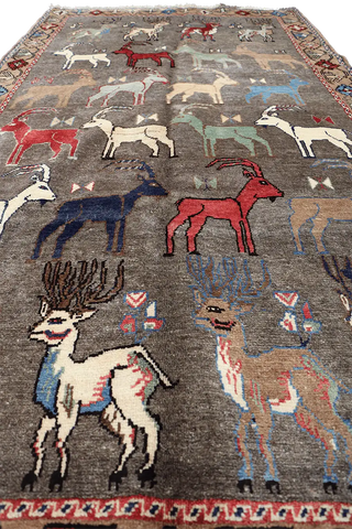 A Persian Qashqai wool rug
