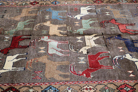 A Persian Qashqai wool rug
