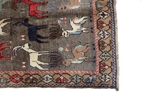 A Persian Qashqai wool rug