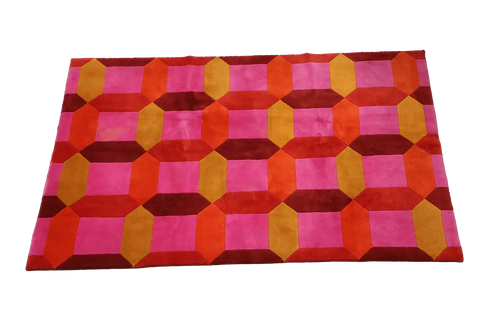 A geometric patterned wool rug 