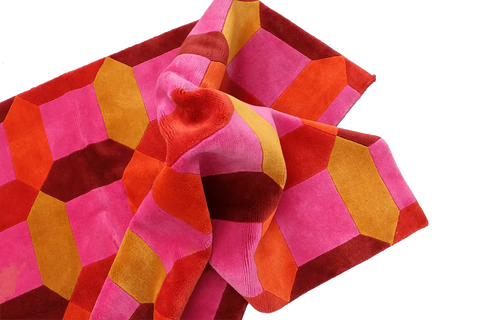 A geometric patterned wool rug 