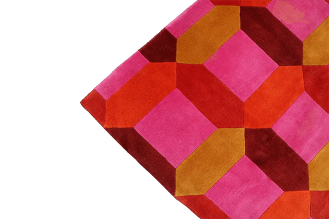 A geometric patterned wool rug 