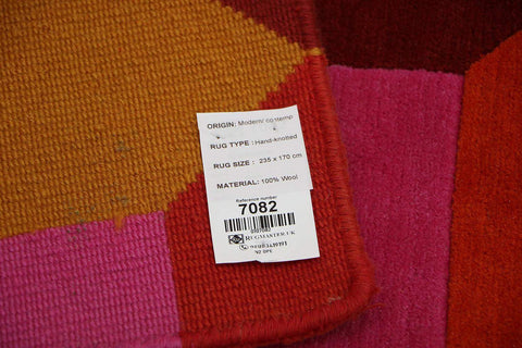A geometric patterned wool rug 