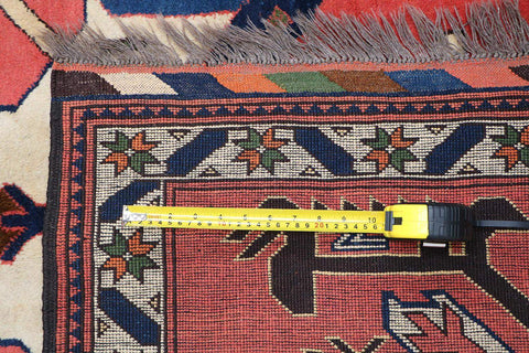 A vibrant Afghan Karegah wool rug
