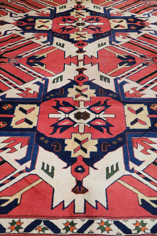 A vibrant Afghan Karegah wool rug