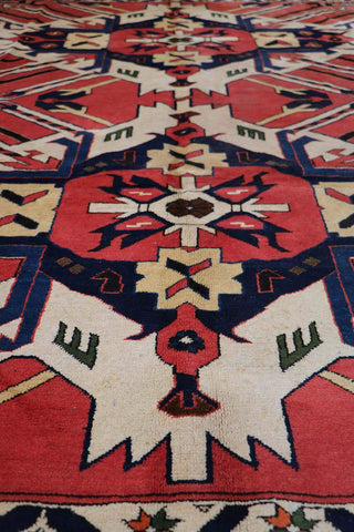 A vibrant Afghan Karegah wool rug