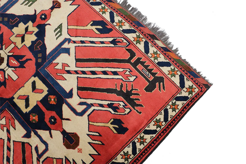 A vibrant Afghan Karegah wool rug