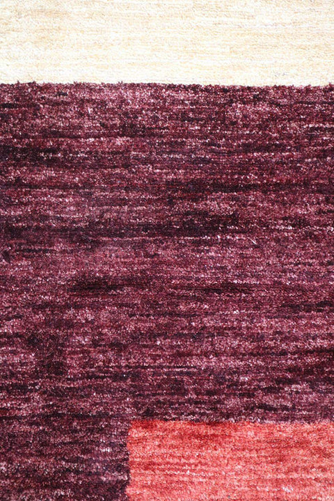 A rectangular Gabbeh tribal wool rug