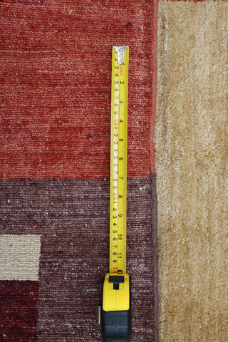 A rectangular Gabbeh tribal wool rug