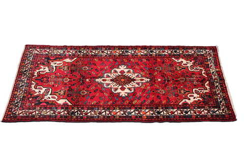 A bold red Hamedan tribal rug