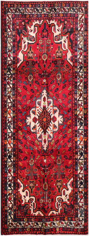 A bold red Hamedan tribal rug
