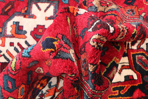 A bold red Hamedan tribal rug