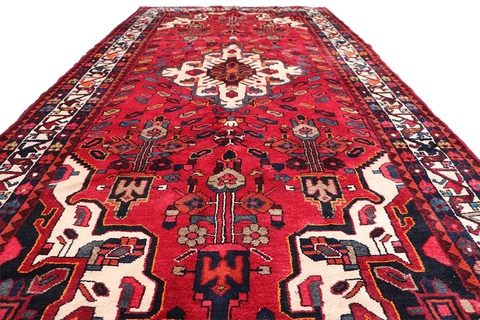 A bold red Hamedan tribal rug