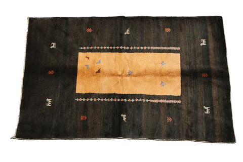 A rectangular Gabbeh Tribal Wool Rug
