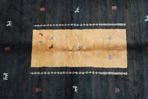 A rectangular Gabbeh Tribal Wool Rug