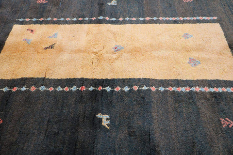 A rectangular Gabbeh Tribal Wool Rug