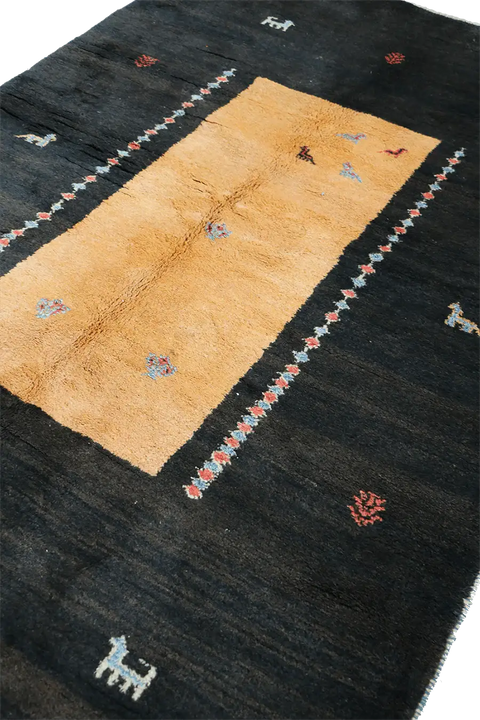 A rectangular Gabbeh Tribal Wool Rug