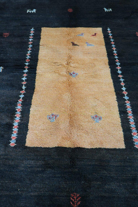 A rectangular Gabbeh Tribal Wool Rug