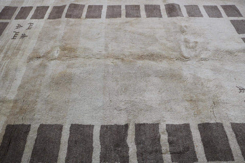 A rectangular Persian Gabbeh Tribal wool rug