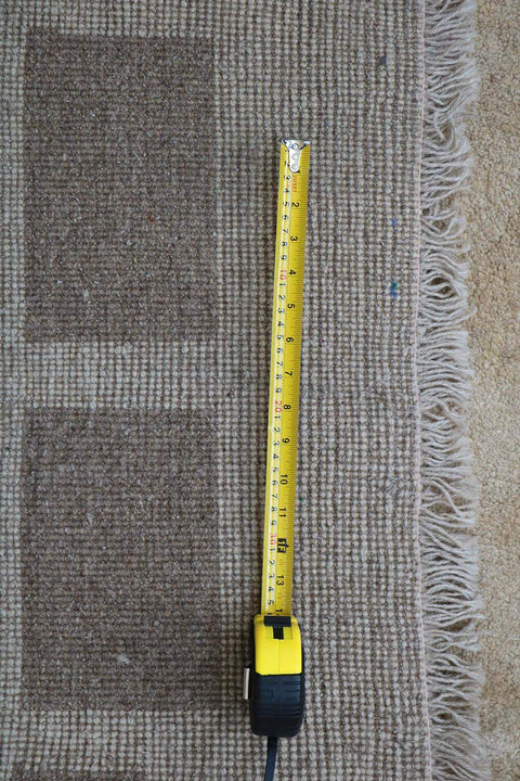 A rectangular Persian Gabbeh Tribal wool rug