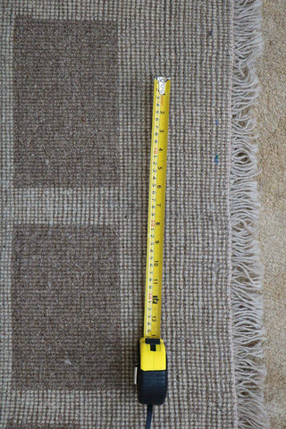 A rectangular Persian Gabbeh Tribal wool rug