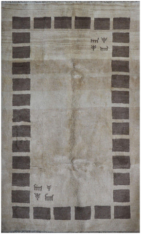 A rectangular Persian Gabbeh Tribal wool rug