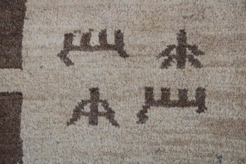 A rectangular Persian Gabbeh Tribal wool rug