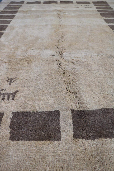 A rectangular Persian Gabbeh Tribal wool rug