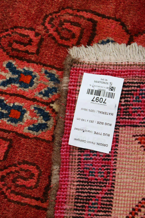 A vertical image of a Persian Qashqai Tribal Rug 