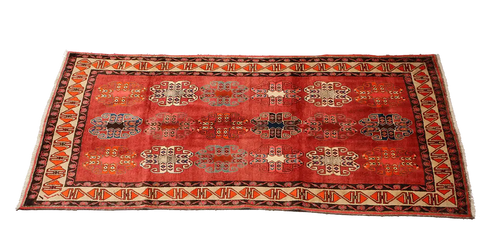 A vertical image of a Persian Qashqai Tribal Rug 