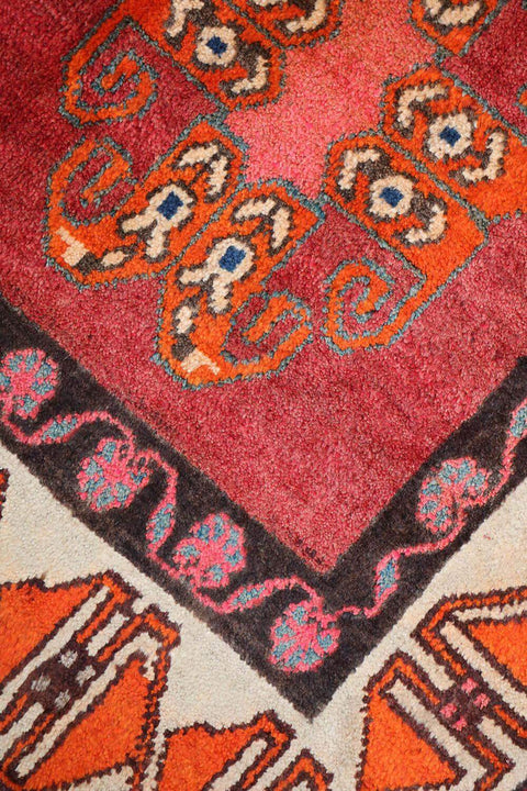 A vertical image of a Persian Qashqai Tribal Rug 