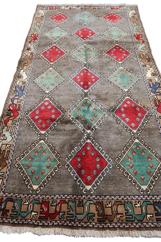 A rectangular Persian Qashqai Tribal Rug 