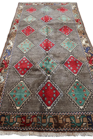 A rectangular Persian Qashqai Tribal Rug 