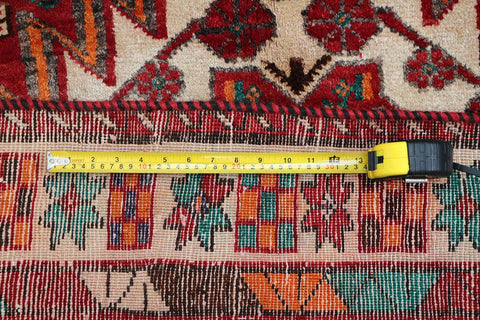 A hand-knotted Persian Qushqai Tribal Rug