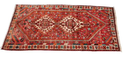 A hand-knotted Persian Qushqai Tribal Rug